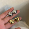 Image of Simple Metal Special-interest Design Three-dimensional Heart-shaped Earrings Shopping