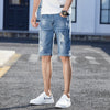 Image of Men's Loose Hole Denim Shorts Shopping