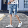 Image of Men's Loose Hole Denim Shorts Shopping