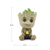 Image of disney Marvel Avengers Groot Mini figure Pen Holder  Flower Pot Anime Toys Action Figure Sitting Groot Christmas Kids Toys Gifts Shopping