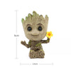 Image of disney Marvel Avengers Groot Mini figure Pen Holder  Flower Pot Anime Toys Action Figure Sitting Groot Christmas Kids Toys Gifts Shopping